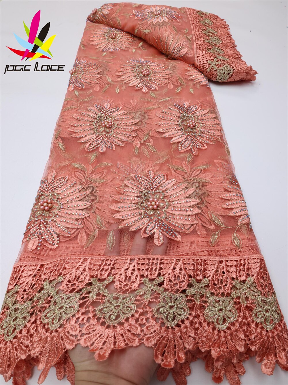 🌷 Beaded Flower Print French Lace – 5 Yards Luxury African Fabric for Dresses & Events
Make a bold fashion statement with this Beaded Flower Print French Lace, crafted with detailed floral patterns, hand-applied beads, and a soft French lace base. This 5-yard fabric is perfect for creating stunning asoebi outfits, bridal gowns, and evening dresses for special occasions.
With its elegant shimmer and textured floral design, it adds a touch of sophistication to any traditional or modern look.
📝 Product Fea