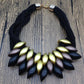 Gold Acrylic Necklace Highlights Swan Neck