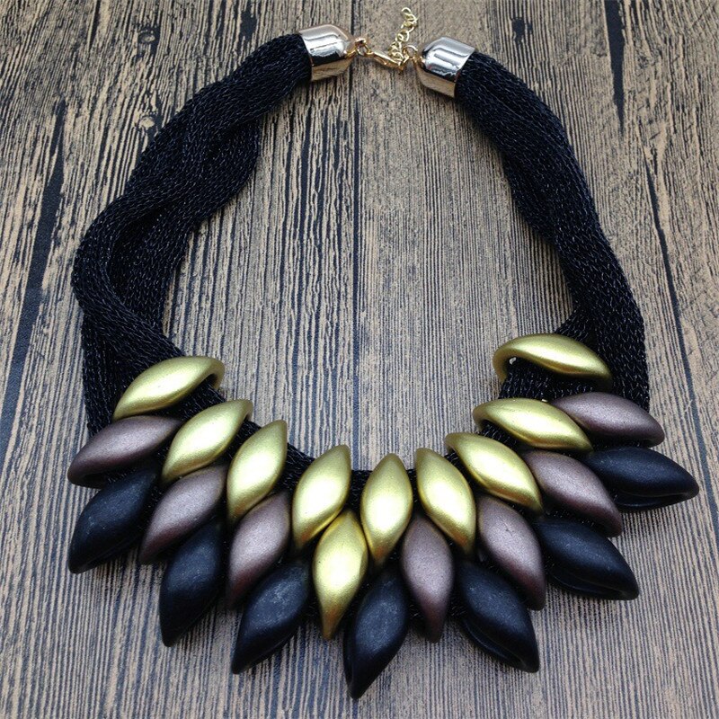 Gold Acrylic Necklace Highlights Swan Neck