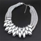 Gold Acrylic Necklace Highlights Swan Neck