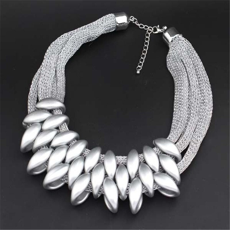 Gold Acrylic Necklace Highlights Swan Neck