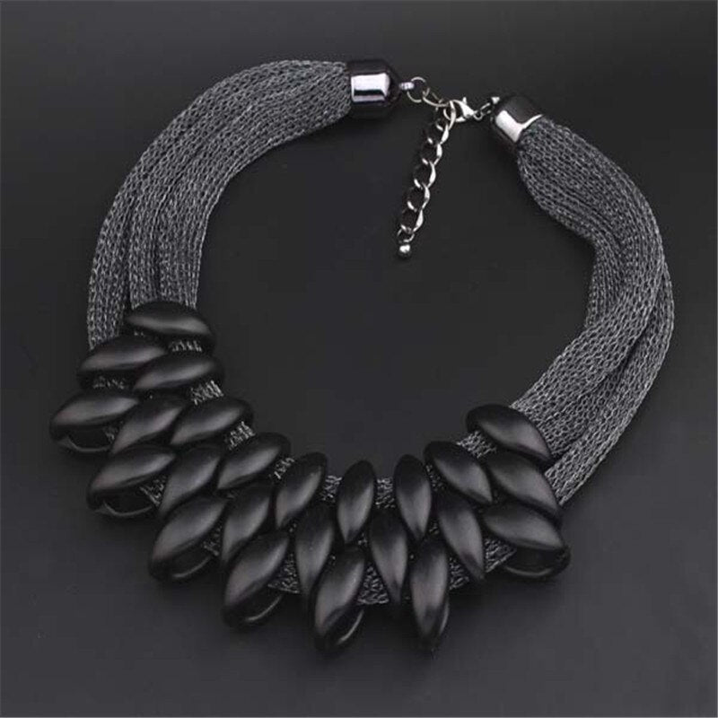 Gold Acrylic Necklace Highlights Swan Neck