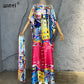 Tropical luxury kaftan dress for women, elegant resort wear with vibrant prints and flowy fabric
