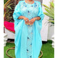 Tropical luxury kaftan dress for women, elegant resort wear with vibrant prints and flowy fabric
