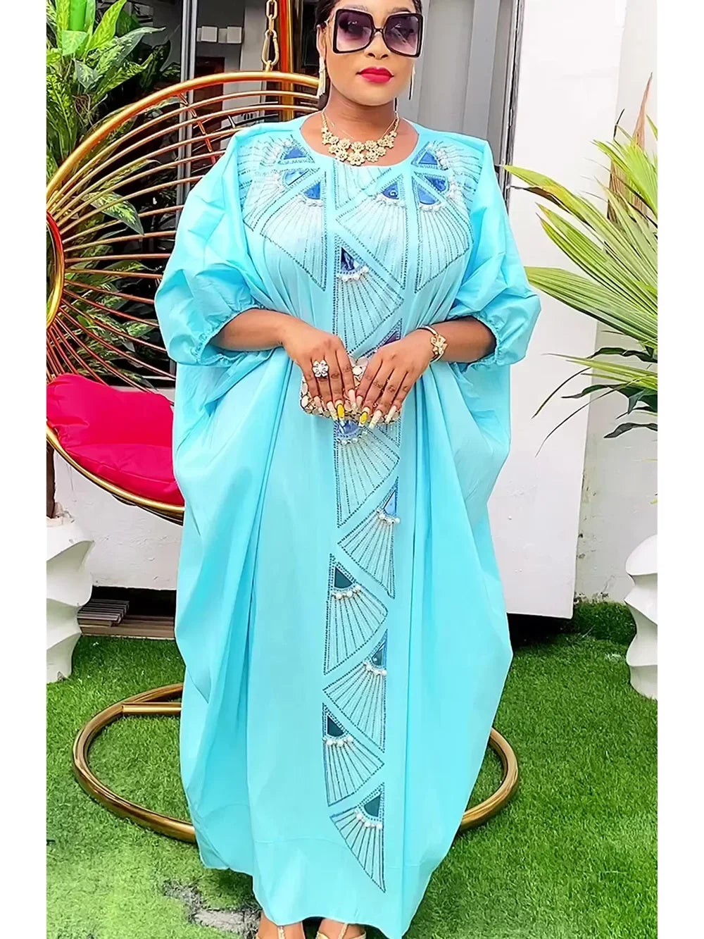 Tropical luxury kaftan dress for women, elegant resort wear with vibrant prints and flowy fabric
