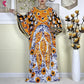 Tropical luxury kaftan dress for women, elegant resort wear with vibrant prints and flowy fabric
