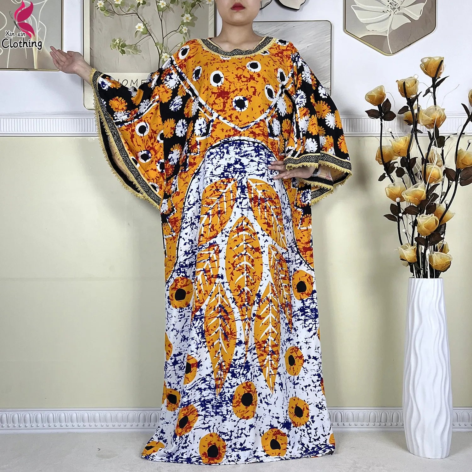 Tropical luxury kaftan dress for women, elegant resort wear with vibrant prints and flowy fabric
