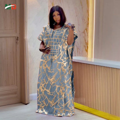 Tropical luxury kaftan dress for women, elegant resort wear with vibrant prints and flowy fabric
