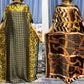 Tropical luxury kaftan dress for women, elegant resort wear with vibrant prints and flowy fabric
