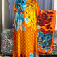 Tropical luxury kaftan dress for women, elegant resort wear with vibrant prints and flowy fabric
