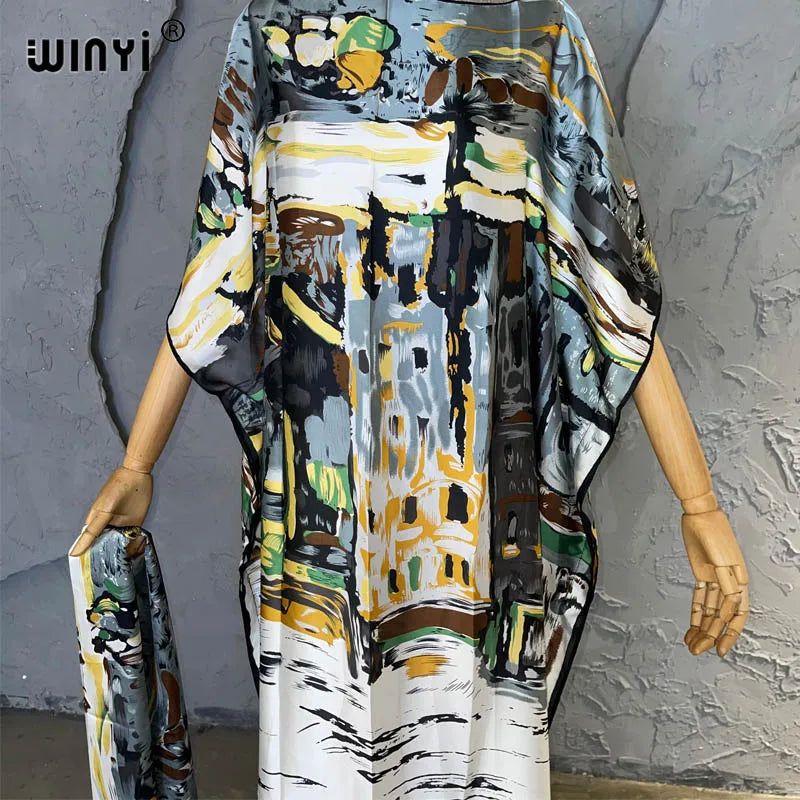 Tropical luxury kaftan dress for women, elegant resort wear with vibrant prints and flowy fabric
